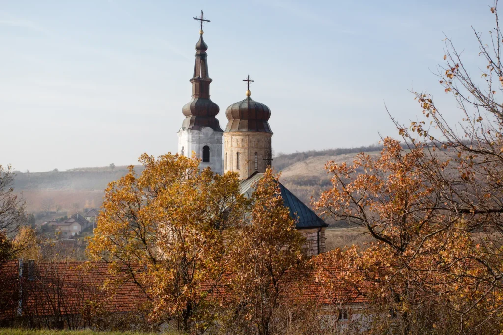 Šišatovac Monastery among autumn trees in Fruška Gora